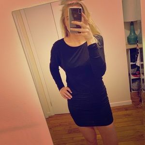 Black mini dress, fitted bottom, blouse top